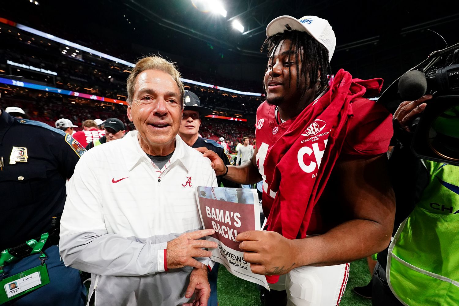 Dec 2, 2023; Atlanta, GA, USA; Alabama Crimson Tide head coach Nick Saban celebrates with defensive lineman James Smith (47) after defeating the Georgia Bulldogs in the SEC Championship at Mercedes-Benz Stadium.